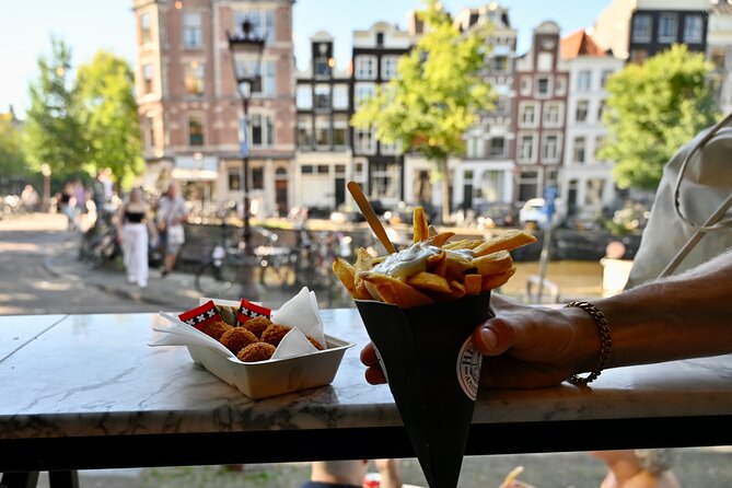 10 Tastes of Amsterdam: Food Tour by UNESCO Canals and Jordaan - Spui Market, Fishmongers, and the Brown Bar Sailors Story