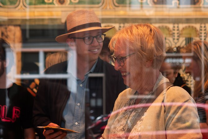 A 3-Hour Private Guided Tour Through Amsterdam with a Local - De Bijenkorf luxury shopping and the old-school city business