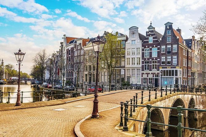 Airport Transfer: Schiphol Airport AMS to Amsterdam by Luxury Van - From AMS arrivals to Amsterdam hotels, minus the stress