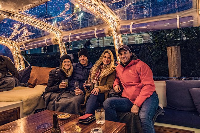 Amsterdam 2-Hour Evening Cruise With Live Guide and Bar - Gliding past the most prestigious church in Amsterdam