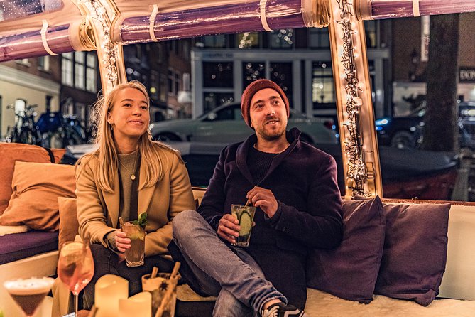 Amsterdam 2-Hour Evening Cruise With Live Guide and Bar - The Skinny Bridge at night: Magere brug
