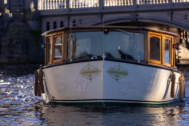 Amsterdam: 2-Hour Luxury Canal Cruise with Snacks & Drinks - Onboard comfort: blankets, a calm vibe, and space to ask questions