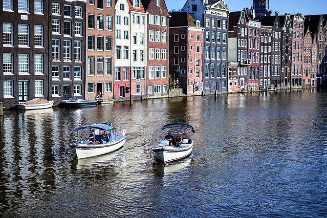 Amsterdam 2-hour Private Canal Cruise with Live Guide and Drinks - Amstel River: old beginnings, modern coexistence