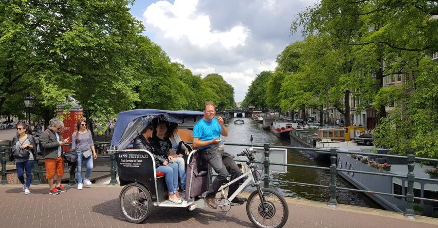 Amsterdam: 2-Hour Sightseeing Tour by Rickshaw - The core route: canals, historic houses, and quick famous-area passes