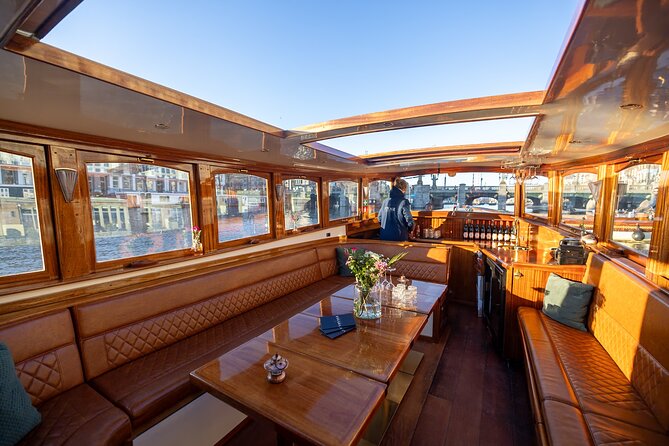 Amsterdam 2 Hour Small-Group Canal Cruise with Dutch Snacks & Bar - Key highlights worth clocking