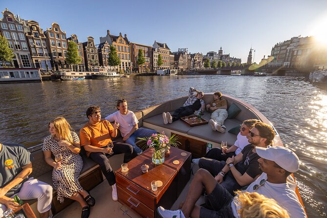 Amsterdam 2 Hour Small-Group Canal Cruise with Dutch Snacks & Bar - Quiet electric-boat cruising that makes canals easy to enjoy