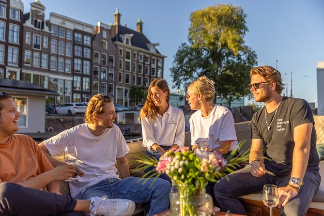 Amsterdam 2 Hour Small-Group Canal Cruise with Dutch Snacks & Bar - Anne Frank House and Westerkerk from the water: the moment that sticks
