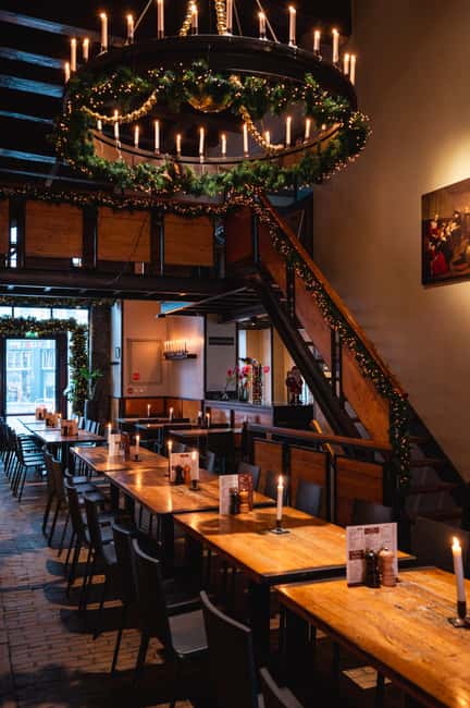 Amsterdam: 3-Course Typical Dutch Menu at In de Waag - Candlelit dining with 300 real candles in grand chandeliers