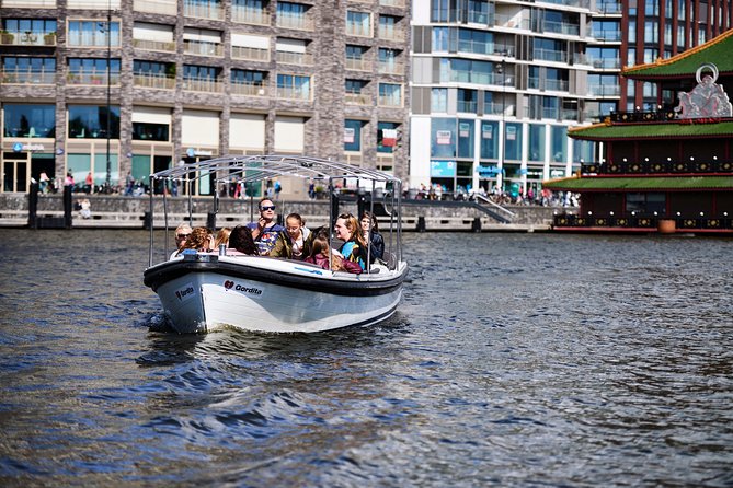 Amsterdam: 60-Minute Guided Private Canal Cruise with Drinks - Stop 1: Jordaan canals for a quieter Amsterdam view