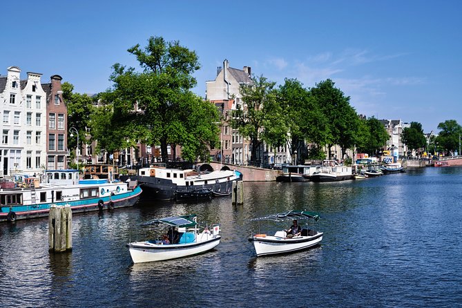 Amsterdam: 60-Minute Guided Private Canal Cruise with Drinks - Stop 2: The UNESCO canal belt and Golden Age architecture