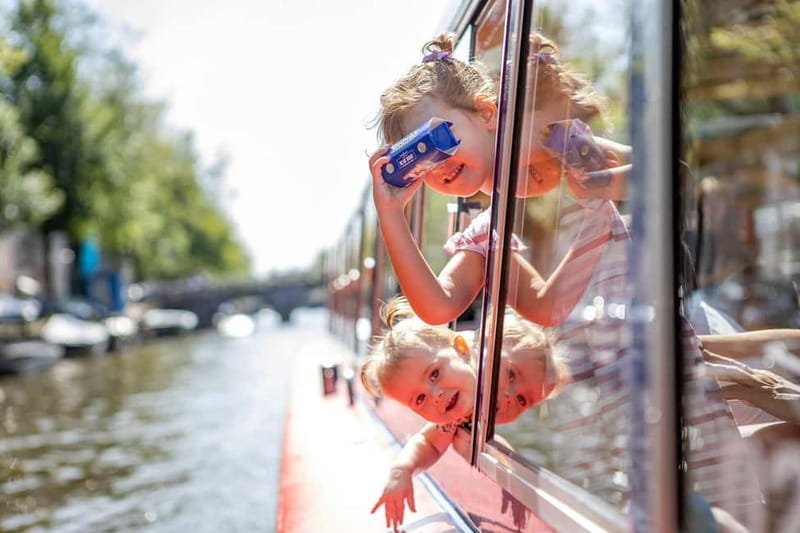 Amsterdam: 75 Minute City Canal Cruise with Audio Guide - Captain Brian and the on-board tone