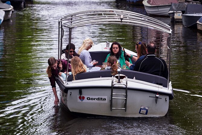 Amsterdam 90-min Private Canal Cruise with Live Guide and Drinks - Amstel River: Where Amsterdam’s Story Began, Plus a Blend of Old and New