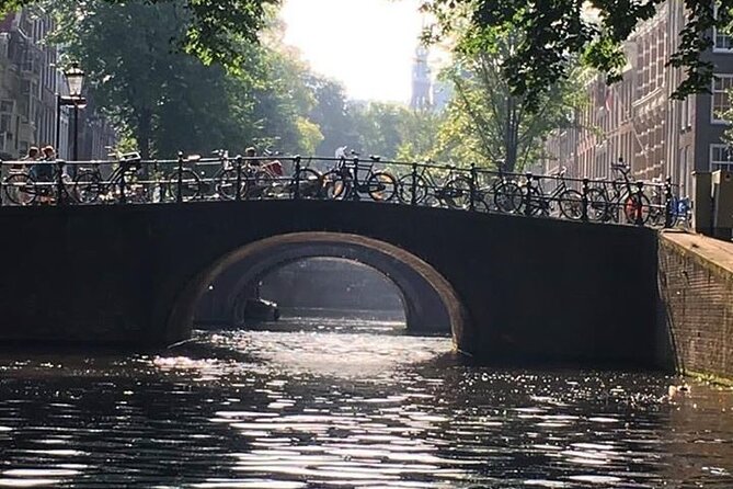 Amsterdam 90-min Private Canal Cruise with Live Guide and Drinks - Dancing Houses and the Monet Canal: Small Oddities, Classic Light, Big Feel-Good Moments