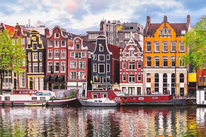 Amsterdam Airport (AMS) Transfer to Amsterdam/Rotterdam/Keukenhof - From Schiphol to City, Without the Airport Chess Game