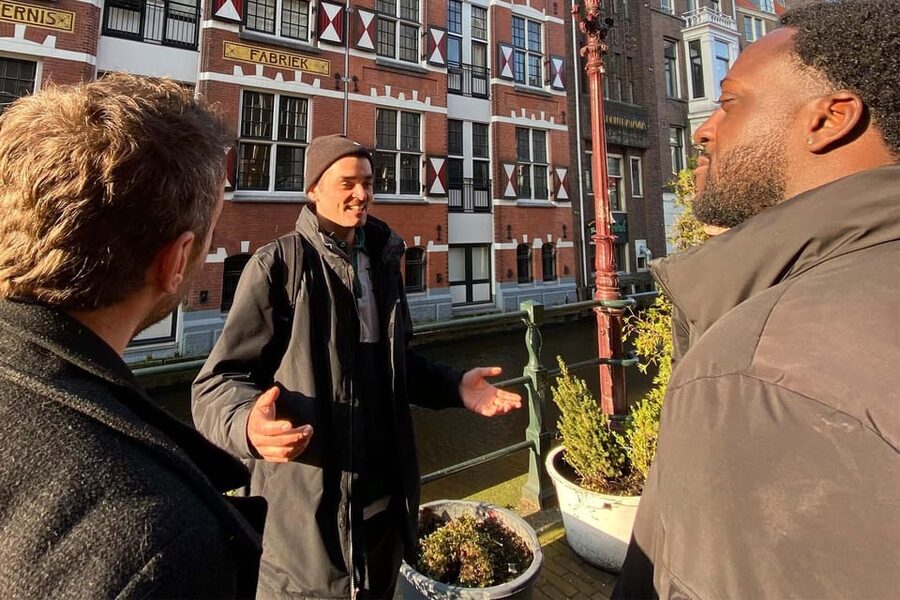 Amsterdam: Anne Frank Guided Small Group Walking Tour - Nieuwezijds Voorburgwal 120: the old Jewish neighborhood feeling in plain sight