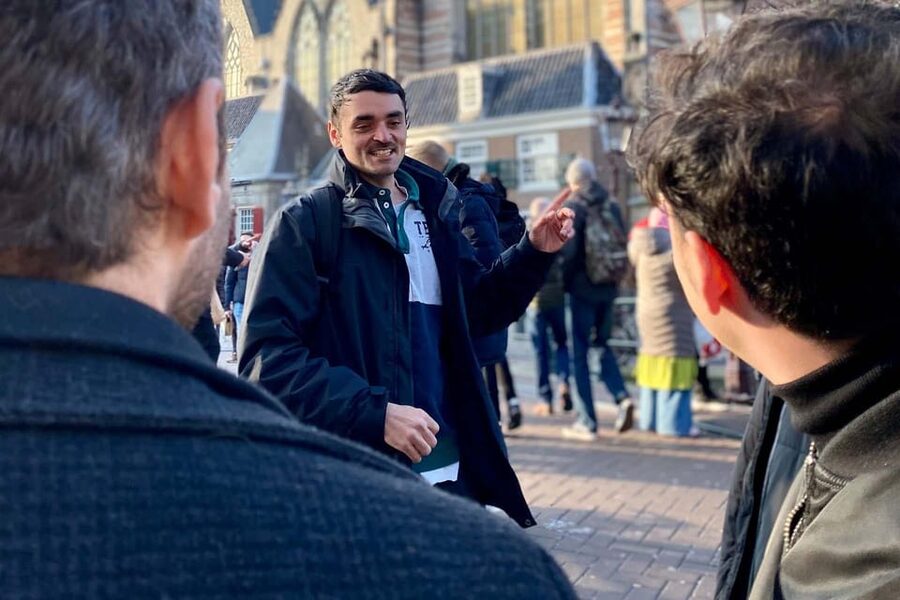 Amsterdam: Anne Frank Guided Small Group Walking Tour - de Silveren Spiegel: canal-side pauses that turn streets into evidence