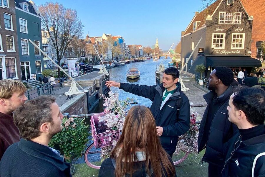 Amsterdam: Anne Frank Guided Small Group Walking Tour - Blauwburgwal: the tour’s momentum, and why it works in small bites