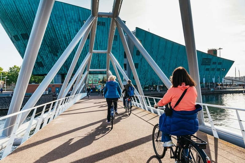 Amsterdam Bike Tour in Small Group + Optional Canal Cruise - Magere Brug: where the postcards get explained in real time