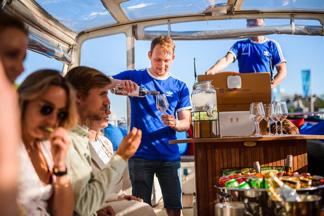 Amsterdam: Canal Booze Cruise with Unlimited Drinks Option - Guides and captains: the onboard energy is the real difference