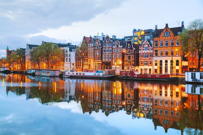 Amsterdam Canal Cruise in Classic Salon Boat With Drinks and Cheese - Cold water comfort: clothing, the step into the boat, and staying relaxed