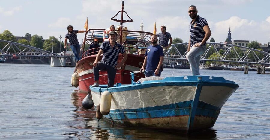 Amsterdam: Canal Cruise on a Wooden Refugee Boat - The Wooden Refugee Boat: What You’re Really Stepping Onto