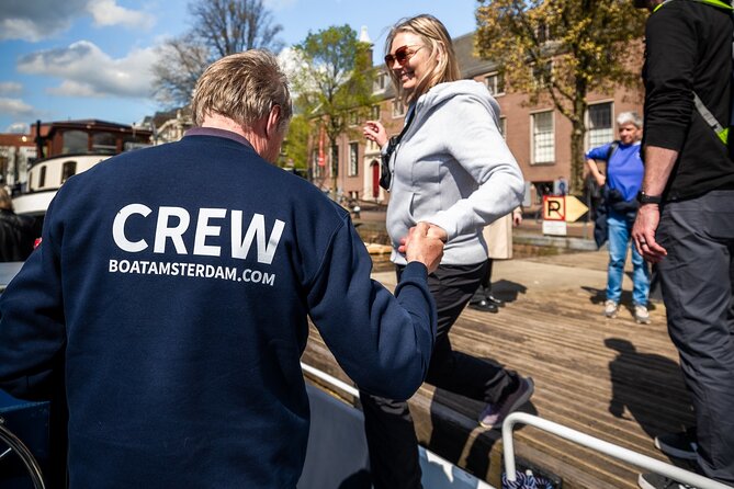 Amsterdam Canal Cruise with Live Guide and Two Drinks - How the open-air electric boat shapes your Amsterdam views