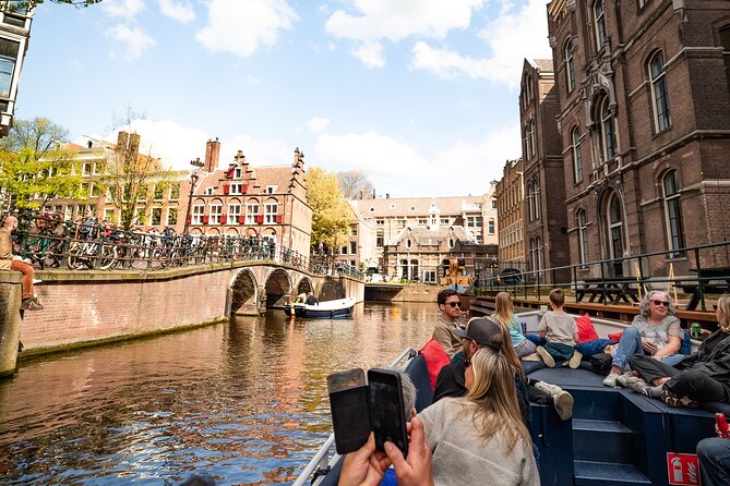 Amsterdam Canal Cruise with Live Guide and Two Drinks - When the weather gets rough: what to wear for open-air comfort