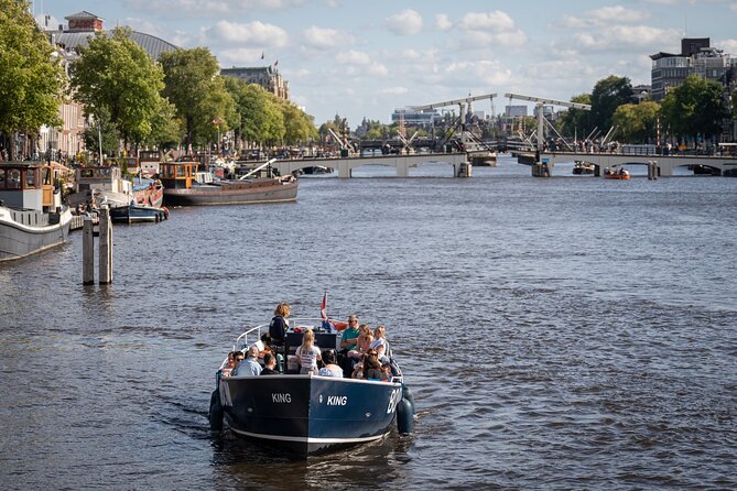 Amsterdam Canal Cruise with Live guide & Two drinks - Central St. - Two drinks and a restroom on board: the comfort upgrades you notice
