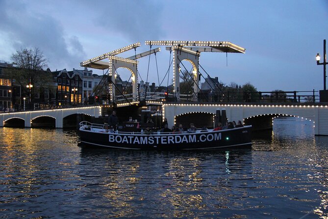 Amsterdam Canal Cruise with Open Bar - Central Station - Museums and unusual stops: NEMO, the hidden attic church, and Icebar
