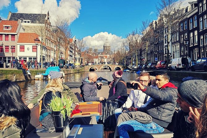 Amsterdam Canal Tour by Open Boat – 90 min Small Group Experience - Tiny canal passages and a defensive medieval tower