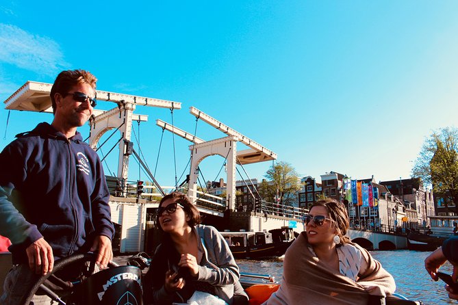 Amsterdam Canal Tour by Open Boat – 90 min Small Group Experience - The Amstel start: dancing houses and leaning building stories