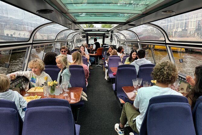 Amsterdam Cheese and Wine Canal Cruise - Guide Energy and the Human Touch on the Water