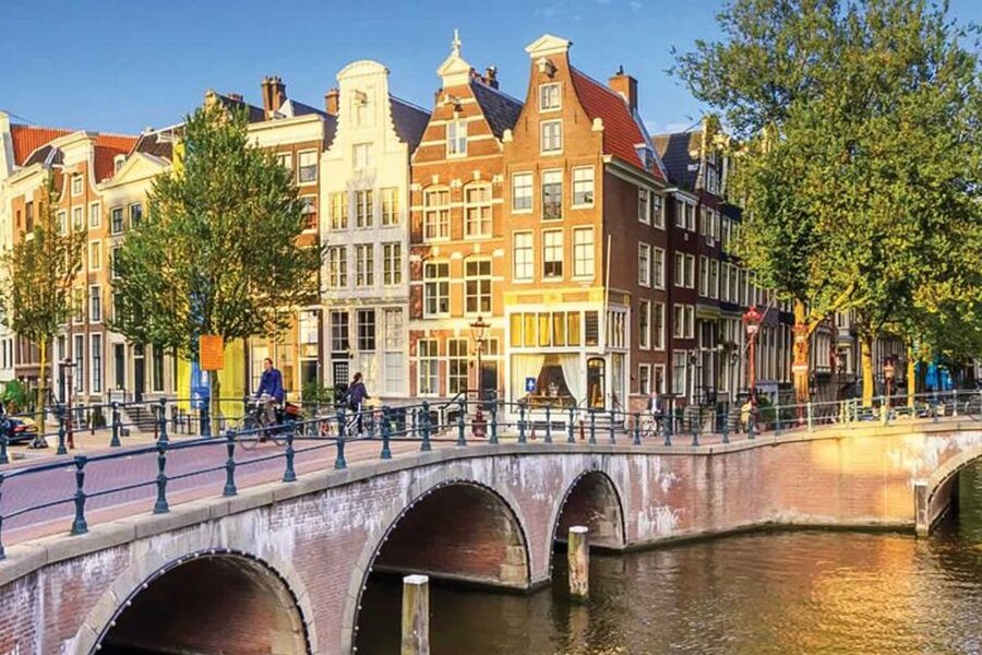 Amsterdam City Center Guided Walking Tour - 12 guests 2,5h - Basilica to Weeping Tower: your first landmarks, plus why they matter