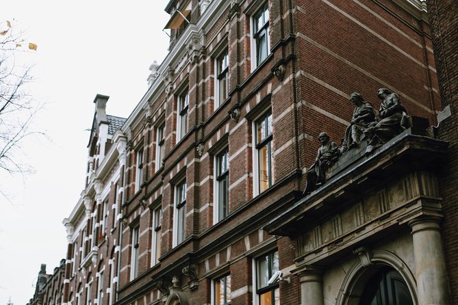 Amsterdam City Center Guided Walking Tour Semi-Private 12ppl Max - Trippenhuis to Oost-Indisch Huis: trade power made visible in architecture