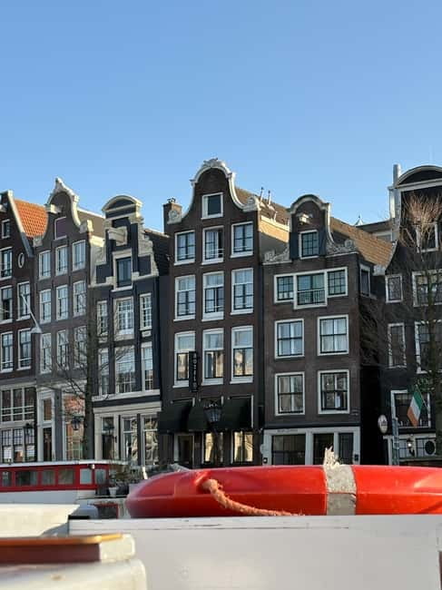 Amsterdam: City Tour in German - Meet at Damrak, then let the mosaic set the story