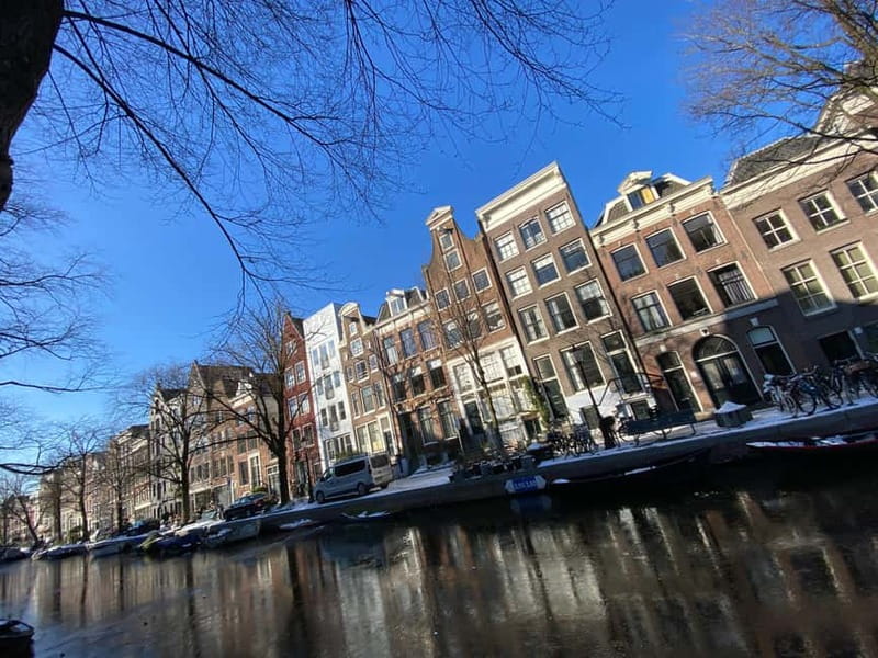 Amsterdam: City Tour in German - Small-group attention: why up to 10 people changes everything