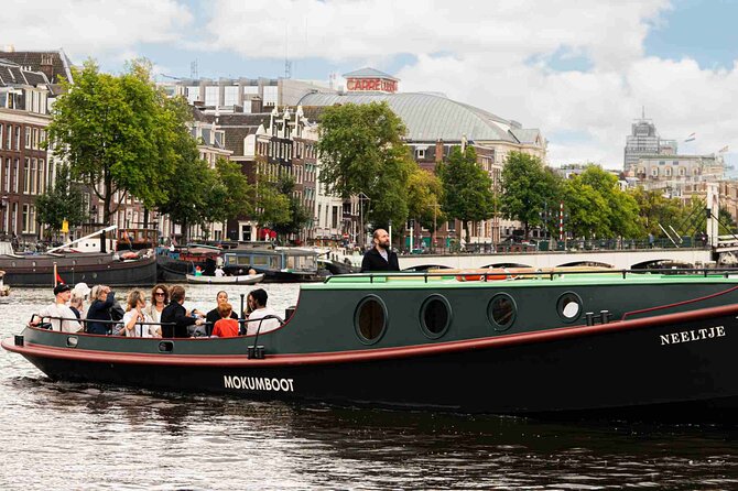 Amsterdam Classic Canal Cruise on a Historic Tugboat - Guide Quality, Hearing Tips, and Photo-Friendly Boat Behavior