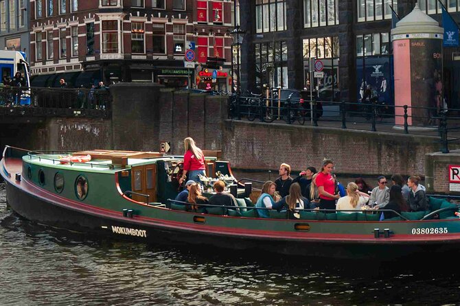 Amsterdam Classic Canal Cruise on a Historic Tugboat - Weather Reality: How to Dress for an Open-Air Cruise