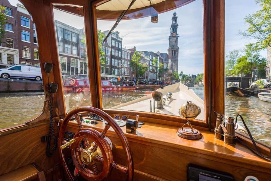 Amsterdam: Classic Saloon Boat Cruise with Cheese & Wine - What the hour feels like once you’re on board