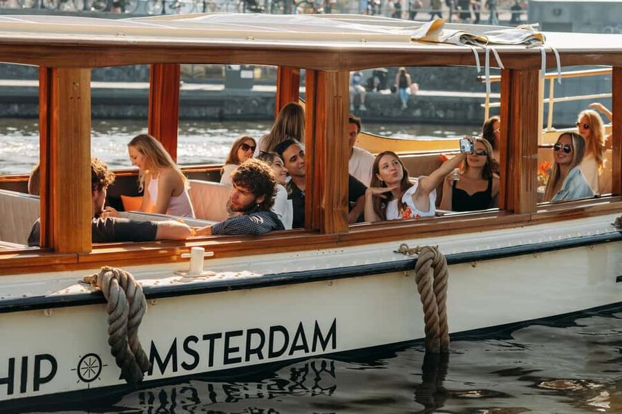 Amsterdam: Classic Saloon Boat Cruise with Cheese & Wine - Maritime Museum, Golden Bend, and the elegance of the canal belt