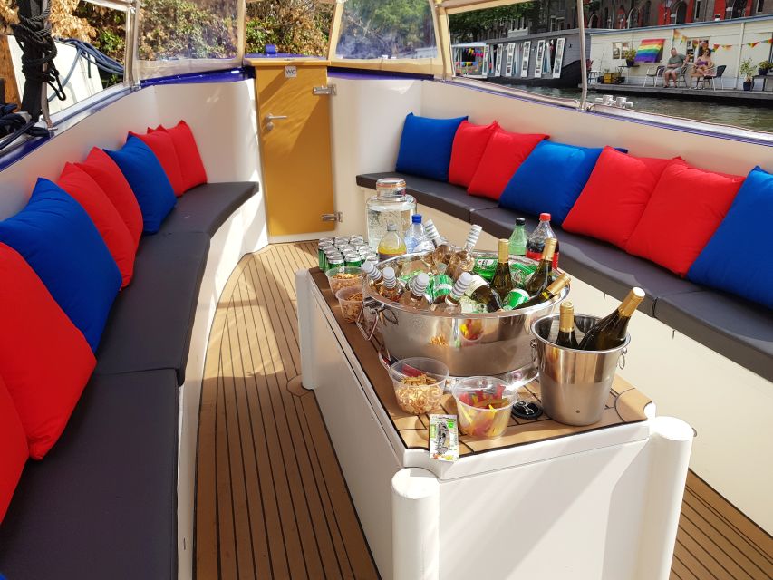 Amsterdam: Covered Canal Booze Cruise with Unlimited Drinks - The hosts and skipper experience: the small-group energy that drives the fun