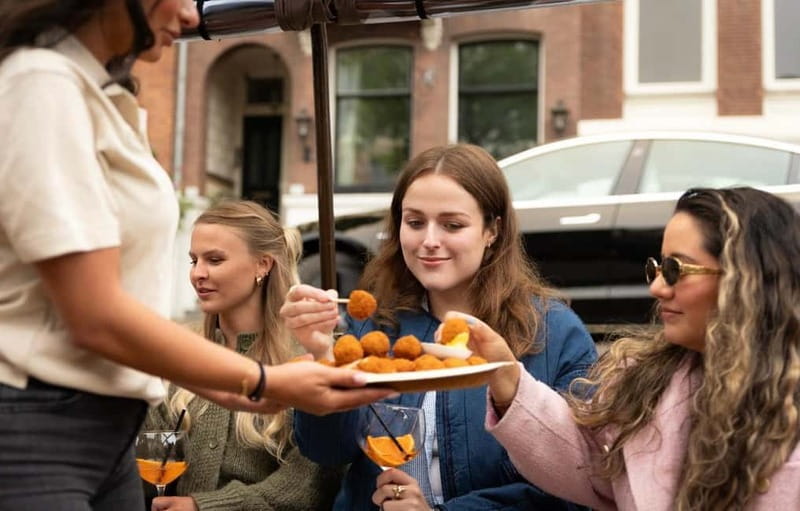 Amsterdam: Covered Heated Canal Cruise with Bitterballen - Who Should Book This Cruise, and Who Might Skip It