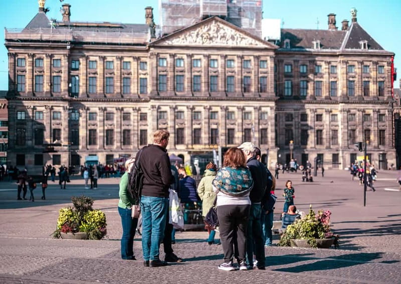 Amsterdam Essentials: From Swamps to Riches - Ending at Amstel River and Dam Square National Monument