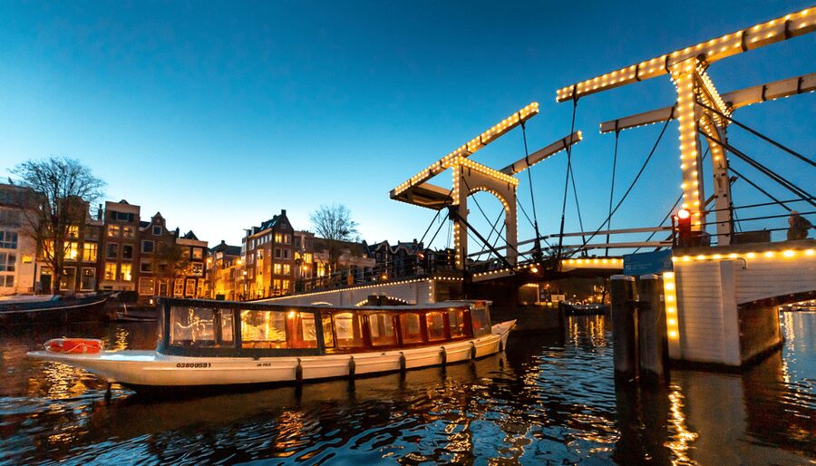 Amsterdam: Evening Canal Cruise with (Open) Bar on Board - The Route at Night, From Westerkerk to the Amstel