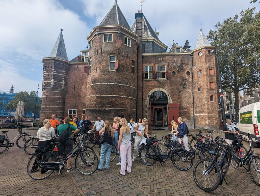 Amsterdam: Explore the City Highlights by Bike - Magere Brug (Skinny Bridge): the drawbridge moment that sells the tour
