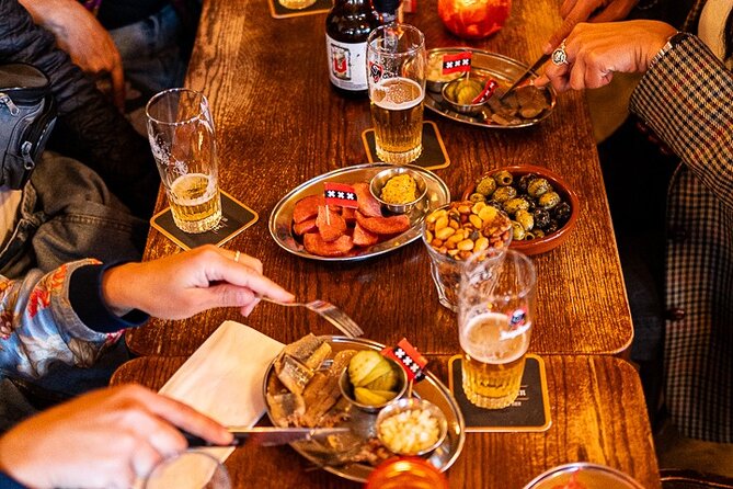 Amsterdam Food Tour: +10 Tastes, Culture and Canals with Sherpa - Starting at Waterlooplein, Then Heading Underground for Flavor