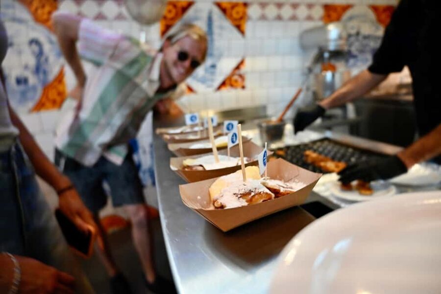 Amsterdam: Food Tour with Drinks by Spui, Canals and Jordaan - Spui Square guided walk: quick orientation, then you snack