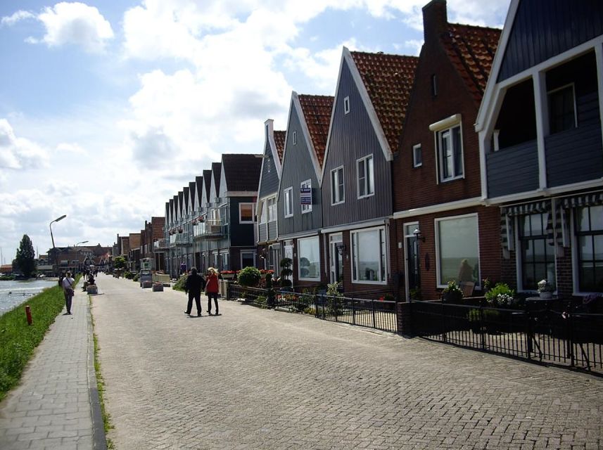 Amsterdam: Full-Day Countryside Tour - Edam and Volendam: Harbor Energy and a Real Taste of Village Life