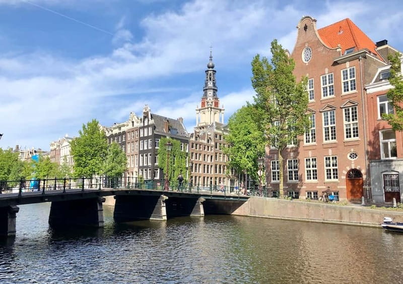 Amsterdam: German Canal Cruise with Unlimited Drinks Option - Your One-Hour Route: Photo Stops That Teach You What to Look For