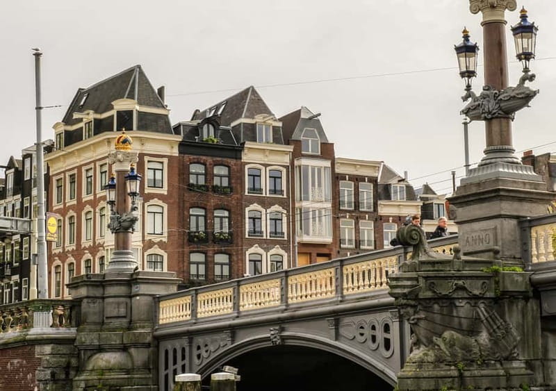 Amsterdam: German Canal Cruise with Unlimited Drinks Option - Magere Brug, Amstel Views, and Jewish Quarter Photo Moments